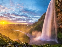 Wodospad Seljalandsfoss,  Islandia, Skały, Promienie słońca