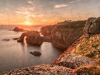 Skały, Morze, Enys Dodnan Arch, Przylądek Lands End, Anglia, Punkt widokowy, Wybrzeże, Zachód słońca, Kornwalia