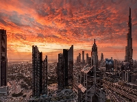 Dubaj, Zachód słońca, Chmury, Wieżowce, Zjednoczone Emiraty Arabskie, Drapacze chmur, Niebo