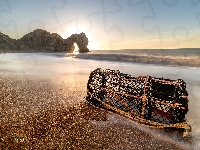 Wschód słońca, Łuk wapienny Durdle Door, Plaża, Kosz, Anglia, Skały, Wybrzeże Jurajskie, Morze, Hrabstwo Dorset