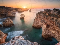 Region Algarve, Skały, Wybrzeże, WSchód słońca, Portugalia, Morze
