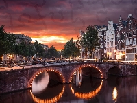 Światła, Holandia, Zachód słońca, Chmury, Drzewa, Amsterdam, Rzeka, Domy, Most, Kanał Leidsegracht